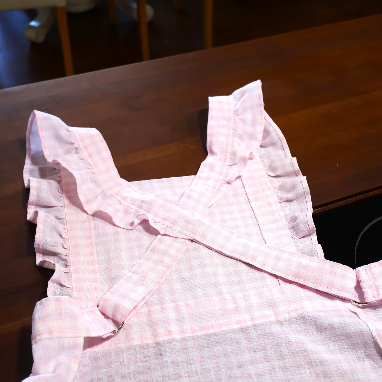 The Willow Ruffle Cross-Back Apron | Adjustable Linen Apron | Feminine Blush Checkered Cottage Apron