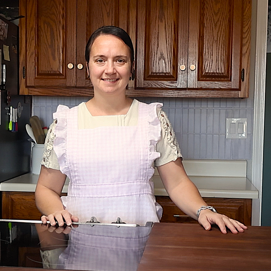 The Willow Ruffle Cross-Back Apron | Adjustable Linen Apron | Feminine Blush Checkered Cottage Apron