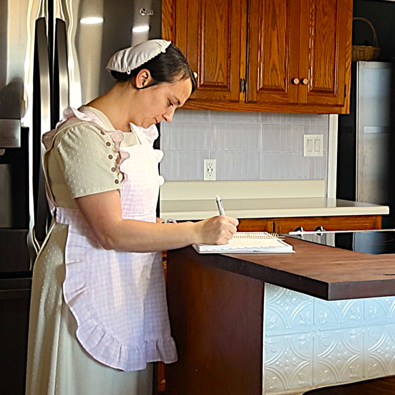 The Willow Ruffle Cross-Back Apron | Adjustable Linen Apron | Feminine Blush Checkered Cottage Apron